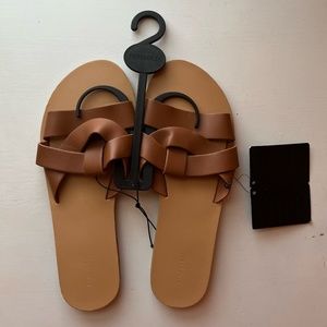 Tan crossed sandals